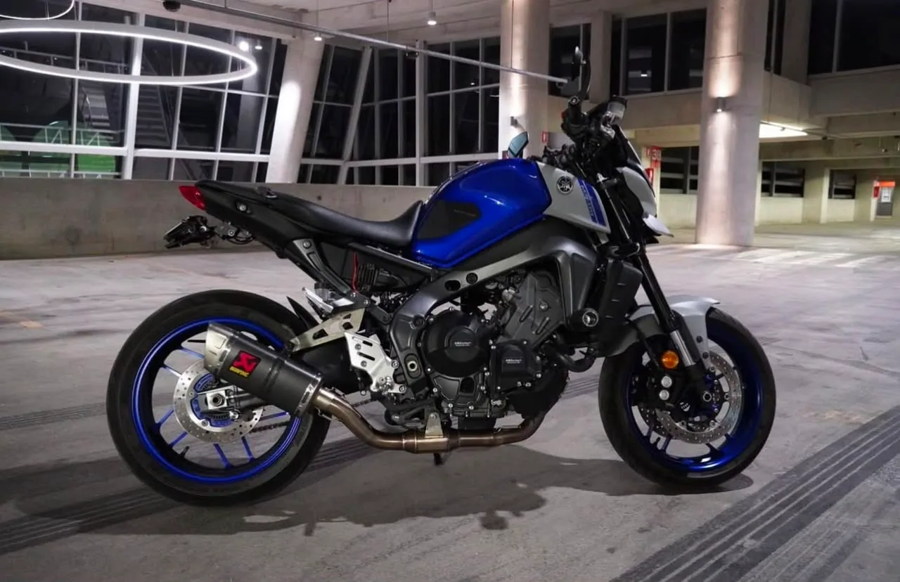 2021 Yamaha MT09 in blue and silver, left-hand side, in a parking garage